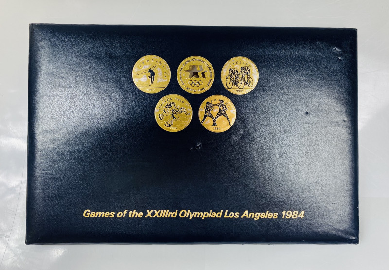 United States Lot of 24 Tokens 1984 "Los Angeles Olympiad"
All sportive discipl...