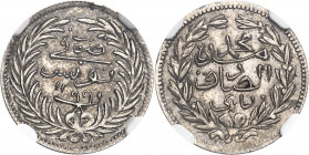 Mohamed el-Sadik Bey (1859-1882). Essai de 1/2 piastre, sans le nom du sultan AH 1299 (1882), Paris.
NGC MS 61 (5781461-038).
Av. Légende et (date) ...