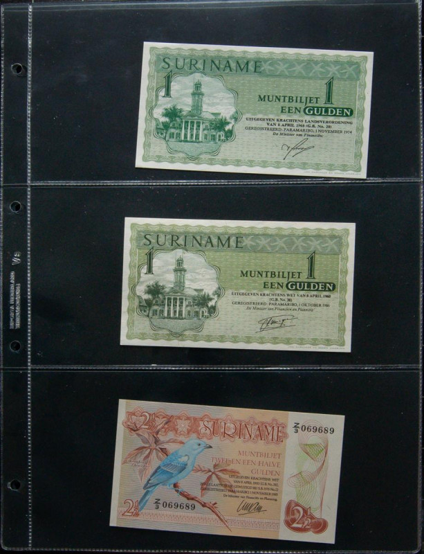 SURINAME. Great set of 33 banknotes, includes rare Pick 154 in grade 65. Uncircu...