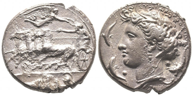 Dionysios I 405-395 avant J.-C.
Décadrachme, Syracuse, AG 41.79 g.
Avers : Quadr...