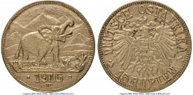 German Colony. Wilhelm II gold 15 Rupien 1916-T AU58 NGC, Tabora mint, KM16.1. Variety with Arabesque below "T". 

HID09801242017

© 2020 Heritage...