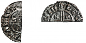 England. Aethelred II 978-1016. AR Half Penny (10mm, 0.57g). Crux type (BMC iiia, Hild. C). Lincoln(?) mint; moneyer Theodgeld(?). Struck circa 991-99...