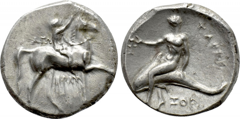 CALABRIA. Tarentum. Nomos (Circa 280 BC). 

Obv: Crowning youth on horse stand...