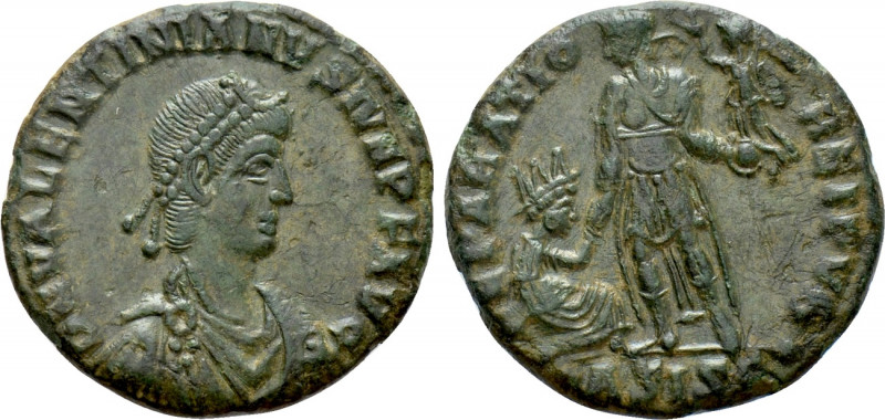 VALENTINIAN I (364-375). Follis. Siscia. 

Obv: D N VALENTINIANVS IVN P F AVG....