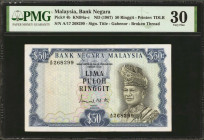 MALAYSIA. Bank Negara Malaysia. 50 Ringgit, ND (1967). P-4b. PMG Very Fine 30.

Printed by TDLR. Signature title of Gabenor. Broken thread variety....