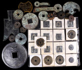 CHINA. Cash, Charms, and Amulets (49 Pieces), ND. Grade Range: VERY GOOD to VERY FINE.

A diverse assortment of Charms and amulets, many shaped like...