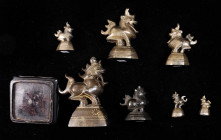 BURMA. Cast Bronze Opium Weights (7 Pieces), ND. Average Grade: VERY FINE.

Modern-made cast weights, modelled after the mythical To, or dragon-lion...