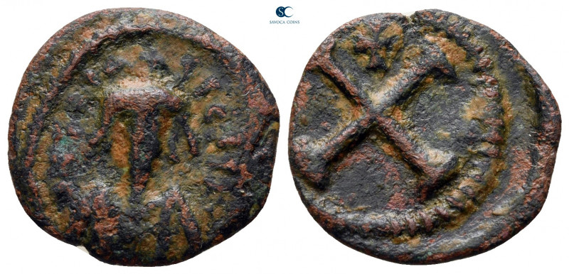 Phocas AD 602-610. Constantinople
Decanummium Æ

18 mm, 1,66 g



nearly ...