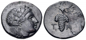 AEOLIS. Temnos. 3rd century BC. Tetrachalkon (Bronze, 18 mm, 4.26 g, 6 h). Youthful head of Dionysos to right, wearing ivy wreath. Rev. T-A Grape bunc...