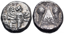 CARIA. Kaunos. Circa 430-410 BC. Stater (Silver, 21.5 mm, 11.68 g, 12 h). Winged female goddess moving to left, her head turned back to right, holding...