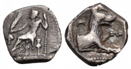 LYCAONIA. Laranda. Circa 324/3 BC. Obol (Silver, 9 mm, 0.54 g, 5 h). Baal seated left, torso facing, holding grain ear and grape bunch in extended rig...