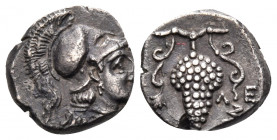 CILICIA. Soloi. Circa 350-330 BC. Obol (Silver, 9 mm, 0.85 g, 7 h). Head of Athena to right, wearing crested Corinthian helmet. Rev. ΣΟΛΕΩΝ Grape bunc...