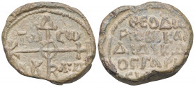BYZANTINE SEALS. Theodoros, Imperial kandidatos & Droungarios of Syke in Cilicia, circa 9th century. Seal or Bulla (Lead, 25 mm, 18.99 g, 12 h). Cruci...