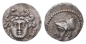 CILICIA, Uncertain. 4th century BC. AR Obol.
Gorgoneion
Helmeted head of Athena left. SNG France 477; SNG Levante 249

Weight: 0,78 gr
Diameter: ...