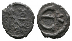 Justin II AD 565-578. Pentanummium Æ.

Weight: 1,3 gr
Diameter: 12 mm