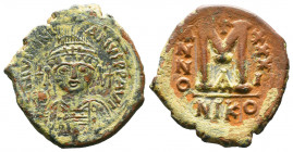 Justinian I (A.D. 527-565), AE Follis,.

Weight:16,46 gr
Diameter:32 mm