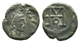Theodosius II, 408-450 AD. AE 11 mm. Constantinople mint.
Obverse: D N THEODO-SIVS P F AVG, pearl-diademed, draped and cuirassed bust right.
Reverse...