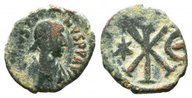 Justinian I (A.D. 527-565), AE Nummi,.

Weight:1,79 gr
Diameter: 14 mm