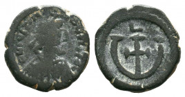 Justinian I (A.D. 527-565), AE Nummi,.

Weight:2,20 gr
Diameter: 15 mm