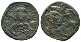 BYZANTINE EMPIRE. Michael VII Æ Follis. AD 1071-1078..

Weight: 6 gr
Diameter: 26 mm