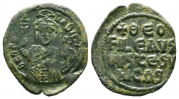 Theophilus AE Follis. 830-842 AD. Constantinople. ThEOFIL' bASIL' CL, crowned, three-quarter length figure of Theophilus facing, pellets on crown, wea...