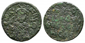 Theophilus AE Follis. 830-842 AD. Constantinople. ThEOFIL' bASIL' CL, crowned, three-quarter length figure of Theophilus facing, pellets on crown, wea...