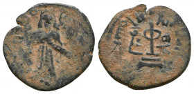 Arab-Byzantine, Umayyad Caliphate Æ Fals..

Weight: 2.6 gr
Diameter: 20 mm
