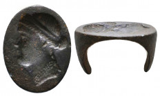 Roman Bronze Seal Ring bust of Ptolemaic queen Berenike II facing left on bezel , 3rd-2nd centuries BC.

Weight: 12.8 gr
Diameter: 26 mm