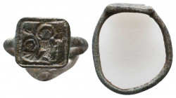 Byzantine Seal Ring with a Religious Depiction on Bezel, Circa 6th - 9th century AD.

Weight: 4.4 gr
Diameter: 26 mm