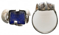 Roman Silver Ring with inlaid Blue Stone , Circa 1st - 2nd Century AD.

Weight: 4.4 gr
Diameter: 23 mm