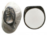 Roman Bronze Seal Ring , Circa 1st - 2nd Century AD.

Weight: 1.2 gr
Diameter: 14 mm