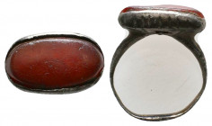 Roman Silver Ring with an inlaid red stone on bezel , Circa 1st - 2nd Century AD.

Weight: 3.5 gr
Diameter: 22 mm