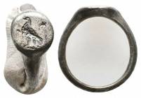 Roman Silver Soldier Ring with an eagle on bezel , Circa 1st - 2nd Century AD.

Weight: 4.6 gr
Diameter: 22 mm