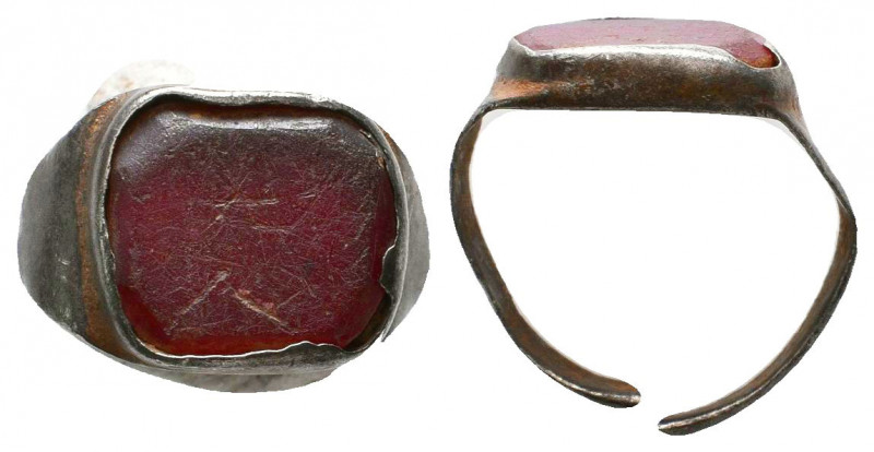 Roman Silver Ring with an inlaid red stone on bezel , Circa 1st - 2nd Century AD...