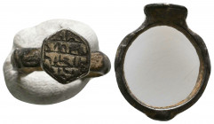 Ancient Solid Silver Ring with Arabic inscriptions on bezel, Circa 13th - 15th Century AD.

Weight: 3.5 gr
Diameter: 21 mm