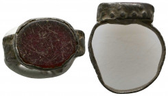 Roman Bronze Ring with an inlaid stones on bezel , Circa 1st - 2nd Century AD.

Weight: 3.4 gr
Diameter: 22 mm