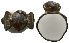 Roman Bronze Ring with an inlaid stones on bezel , Circa 1st - 2nd Century AD.

Weight: 3.1 gr
Diameter: 23 mm