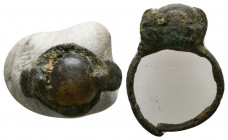 Roman Bronze Ring with an inlaid stones on bezel , Circa 1st - 2nd Century AD.

Weight: 2.5 gr
Diameter: 20 mm