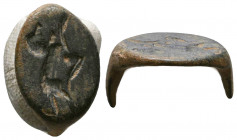 Roman Bronze Seal Ring with a deity on bezel , Circa 1st - 2nd Century AD.

Weight: 4.3 gr
Diameter: 20 mm