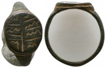 Ancient Bronze Ring with arabic inscription on bezel, 

Weight: 5.7 gr
Diameter: 24 mm