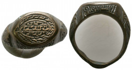 Ancient Bronze Ring with arabic inscription on bezel, 

Weight: 12.3 gr
Diameter: 26 mm