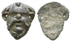 Roman Bronze Head of Silenus . 1st-2nd century AD. .

Weight: 13.2 gr
Diameter: 27 mm