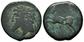 North Africa. Massinissa or Micipsa. AE 27. 148-118 BC. (Mazard-50). (Sng Cop-505/508). Anv.: Laureate and bearded head left. Rev.: Horse galloping le...