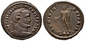Galerius Maximian. Follis. 305-307 AD. Heraclea. (Spink-14542). Rev.: GENIO POPVLI ROMANI, Genius standing facing, holding patera from which liquid fl...