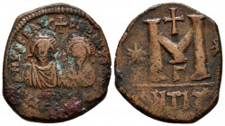 Justin I and Justinian I. Follis. 527 AD. Antioch. (Sear-129 var). Anv.: Crowned and draped facing busts of Justin and Justinian; cross above. Rev.: B...
