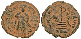 Arab-Byzantine. AE follis (22.3 mm, 2.55 g, 7 h). Jund Hims (Emisa) mint. Standing Caliph with long robes, blundered inscription, hanging on to sword ...