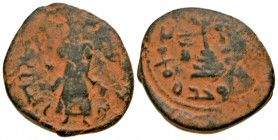 Arab-Byzantine. AE follis (19.6 mm, 3.78 g, 9 h). most likely unofficial counterfeit. Possibly Hims Mint (Emesa) mint. Standing Caliph with long robes...