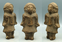 A lovely Manteno figure from Ecuador, ca. 1000 - 1500 A.D. This mold-made female is 7-1/8? high and is depicted standing, with hands held to her sides...