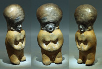 An excellent Jamacoaque figure from Ecuador, ca. 300 BC - 400 A.D. It is 5-3/8? high and depicts a pregnant female. She is posed standing, with hand c...