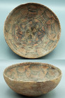 A lovely Harappan bowl from the Indus Valley, ca. 2500 - 1800 B.C. This fine thin-walled example is 6-3/4? in diameter, stands on a ring base and feat...